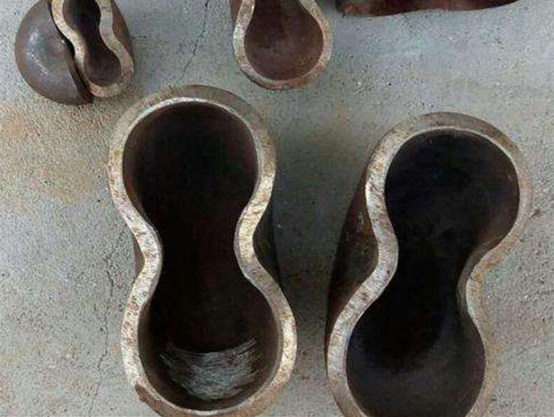 元宝弯头冲压成型工艺与两半焊接优势解析(图1)